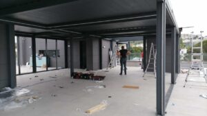 Modern Aluminum Pergola Canopy with Oversized Doors and Motorized Roof Shutters with Lighting img2